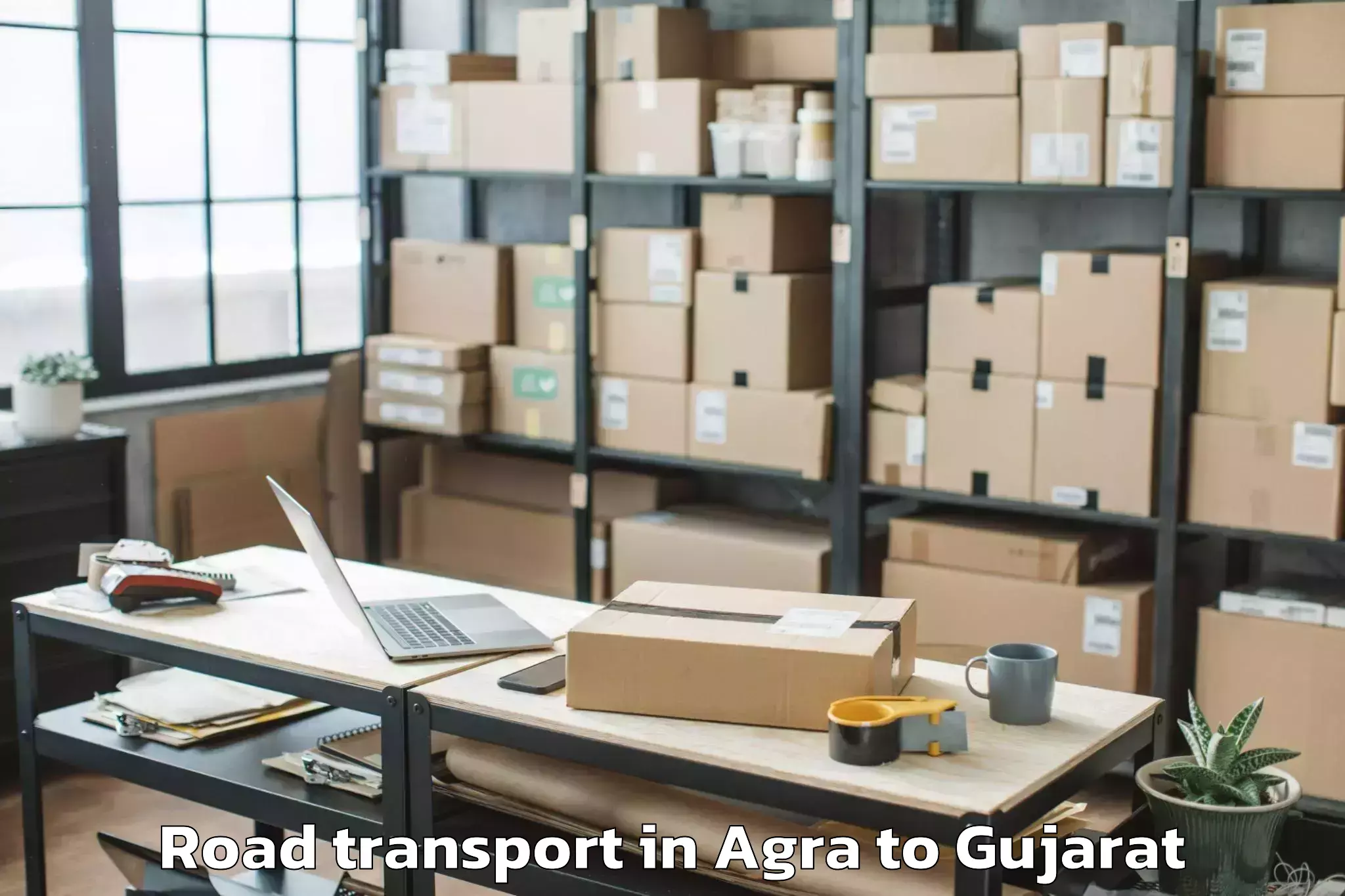 Book Agra to Dahod Road Transport